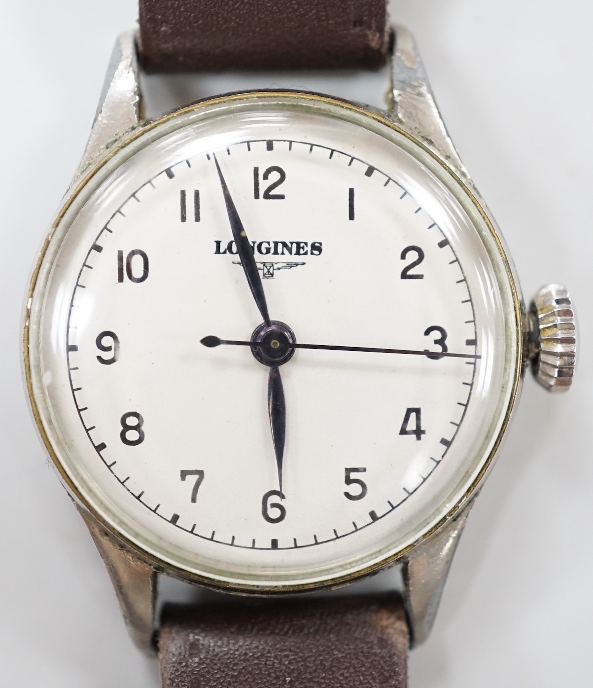 A gentleman's 1940's? steel Longines manual wind wrist watch, movement c.12.68N, case diameter 32mm, on later leather strap.